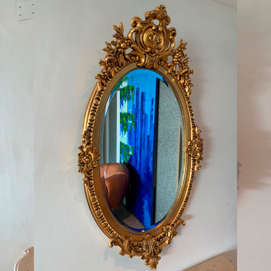 Espejo ovalado dorado estilo Luis XVI